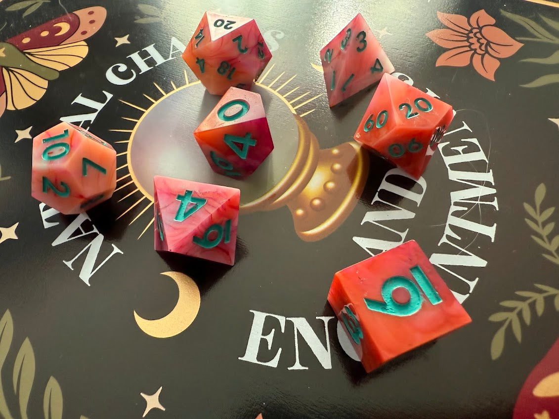 Set of colorful dice on a decorative board with text and graphics