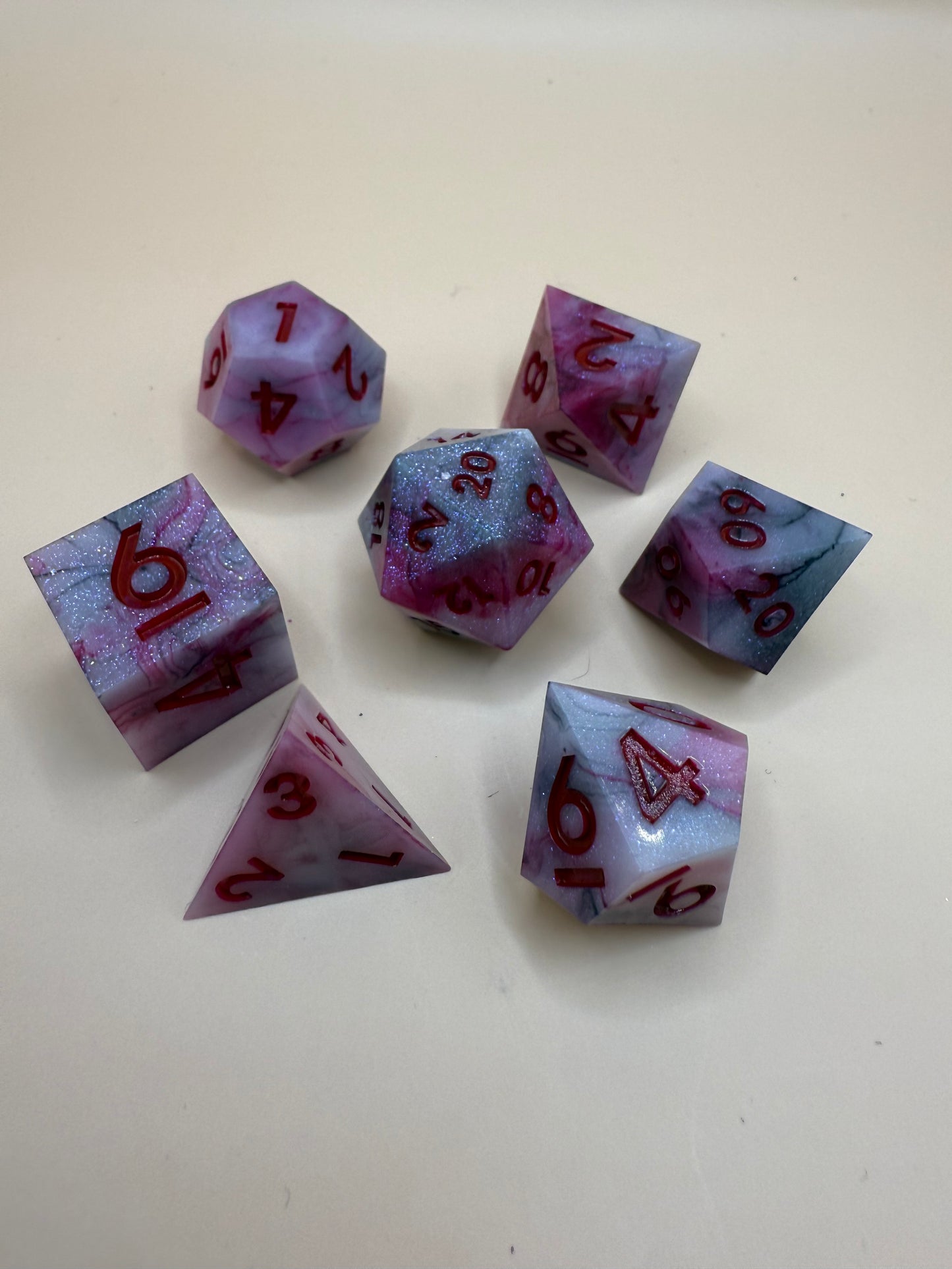 Set of red and black dice with red numbers on a white background