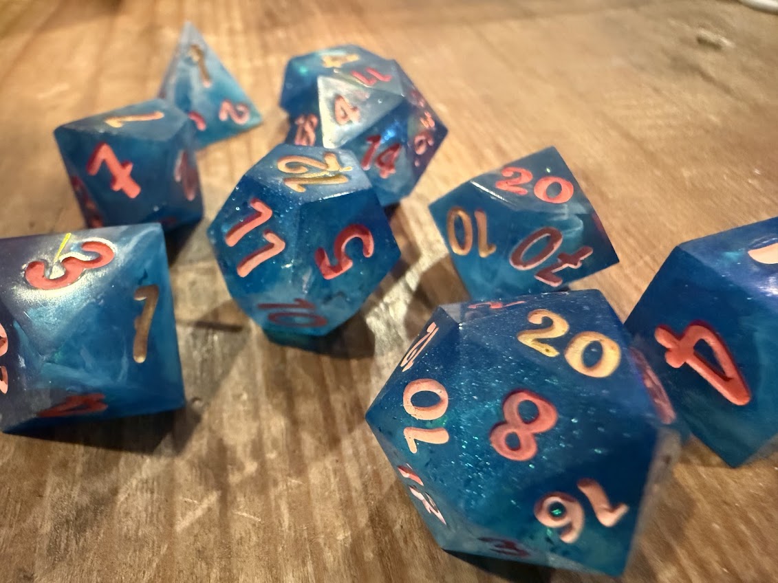 Deep Blue Seas Dice Set - Red Star Dice