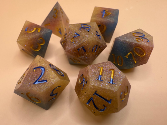 Set of polyhedral dice with numbers on a beige background