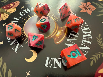 Set of colorful dice on a decorative board with text and graphics