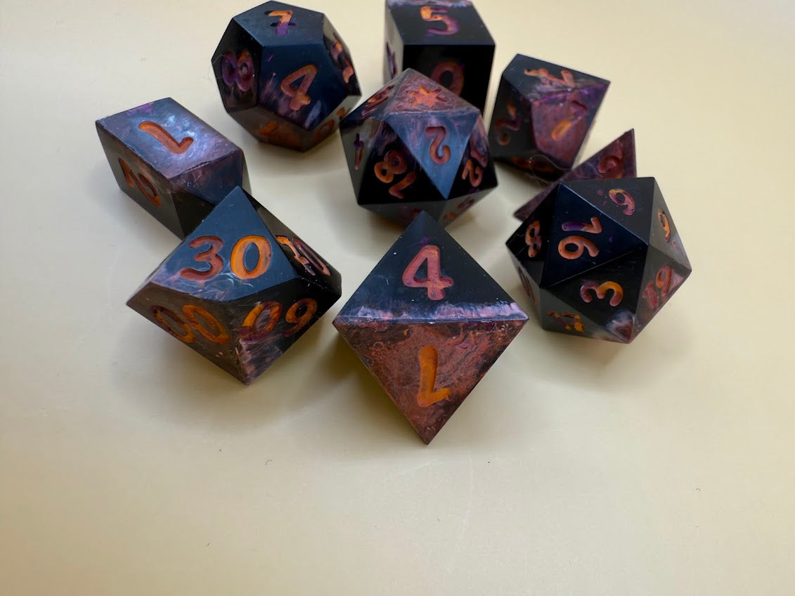 Set of polyhedral dice with numbers on a light background